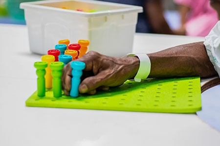 Hand Function Training in Stroke Patient by Using Various Colors Pegboard